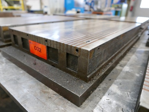 Magnetic clamping plate